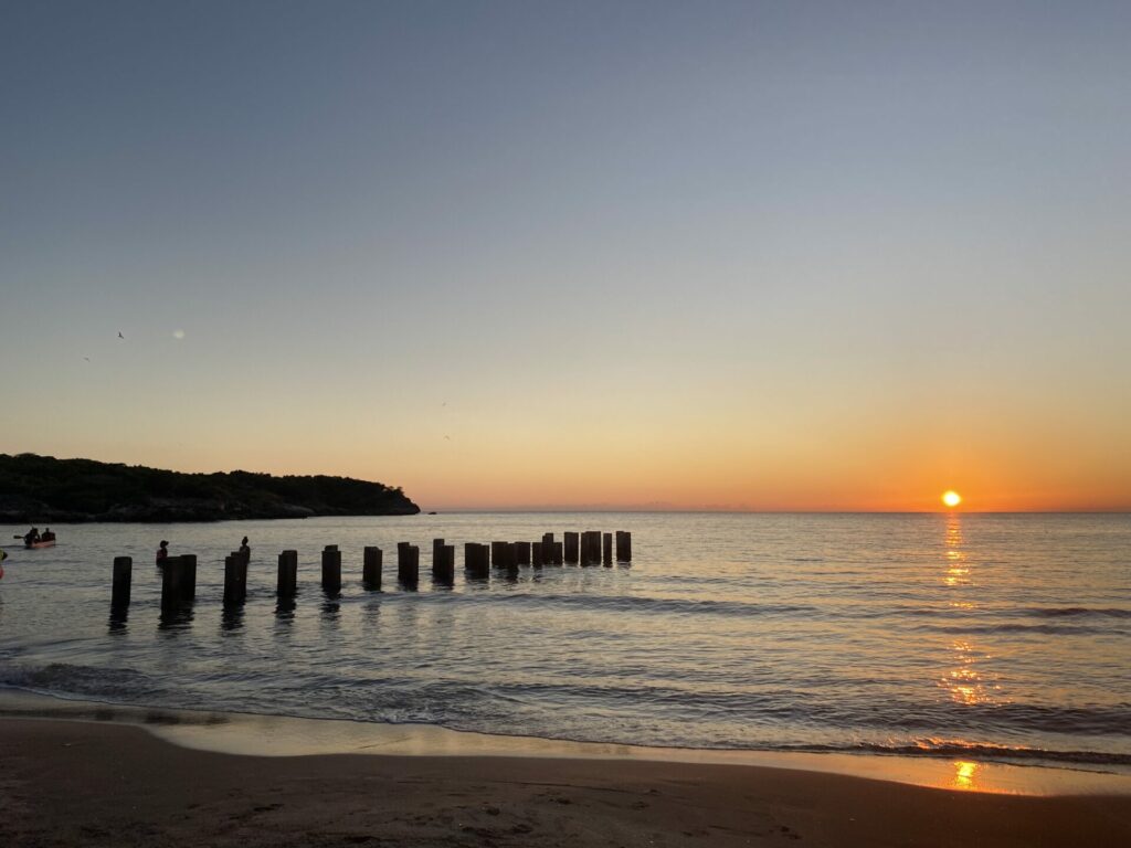 Sunset from the beach of a mental health retreat