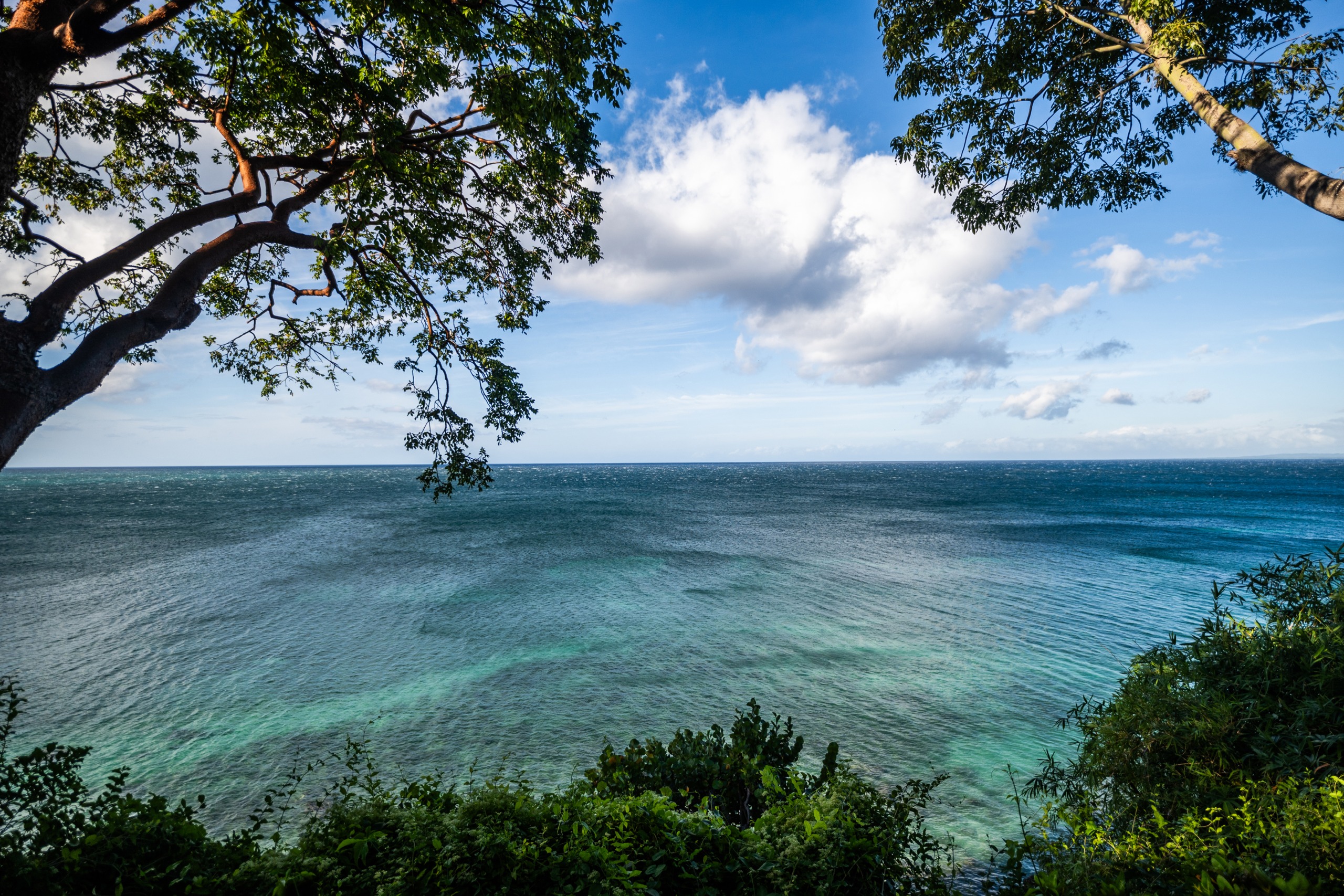 Blue water and skies on the coast of Bluefields Bay in Jamaica.