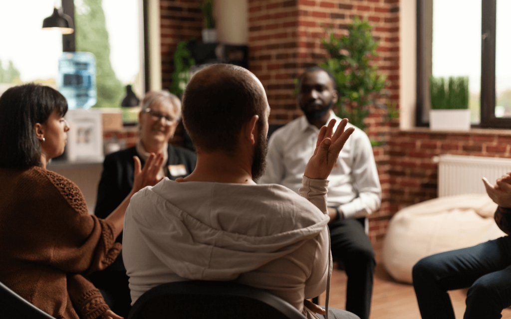 An Alcoholics Anonymous meetup group of 5 people.